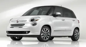 White Fiat 500L compact car with a sleek design and modern features, showcasing its stylish exterior and efficient performance.