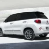 Fiat 500L white compact SUV showcasing modern design and features, ideal for urban driving and family use.